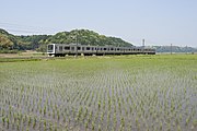 水郷駅 - 小見川駅間の田園地帯を走る209系（千葉県香取市）