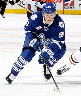 Photographie couleur d'un joueur de hockey sur glace