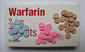 3 mg (blue), 5 mg (pink) and 1 mg (brown) warfarin tablets (UK colours)