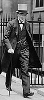 Winston Churchill in a frock coat with grey top hat, 1912.