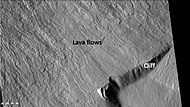 Wide view of lava flowing over cliff around Olympus Mons, as seen by CTX