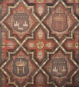 Henry IV courtyard, coats of arms under the awning. The geometric motifs evoke the Mudejar style, but also Serlio's engravings (redesigned after the Renaissance).