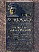 A memorial plaque on the wall of 2 Pawińskiego Street in Warsaw