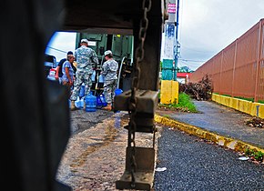 Puerto Rico National Guard with water trucks