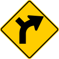 P-2-7 Side road junction on a curve (outside) sign (right) (left if reversed)