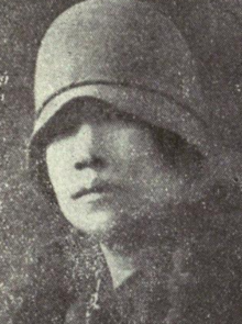 Yang Ling-fu wearing a cloche hat low over her eyes