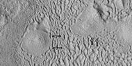 Brain terrain being formed, as seen by HiRISE under HiWish program Note: this is an enlargement of a previous image using HiView. Arrows indicate spots where brain terrain is beginning to form.