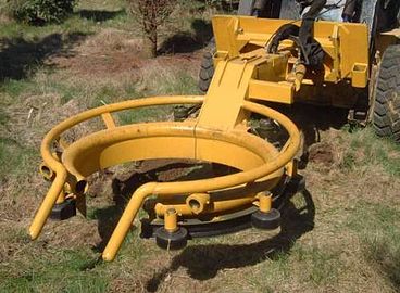 Close-up view of a tree baler