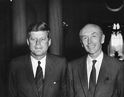 Douglas-Home and John F. Kennedy smiling for a photo.