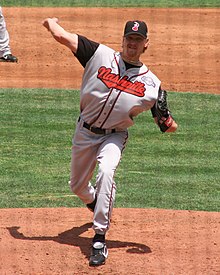 A baseball player in gray