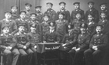 B&W photo of men in uniform