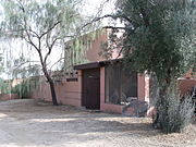The Squaw Peak Inn was built in 1937 and is located at 4425 Horseshoe Road close to the east end of Squaw Peak Mountain in Phoenix. Among celebrities who have stayed in or visited the Inn, which was originally named Squaw Peak Ranch, are Dick Powell, June Allyson and Mamie Eisenhower. It served as the vocal point for the 1987 made-for-TV movie Probe: Plan Nine from Outer Space. The Inn was used as a backdrop during the interview made to Phoenix Suns Charles Barkley by ABC's prime Time Live on May 27, 1993. On January 12, 1995, the property was listed in the National Register of Historic Places, reference: #94001537.