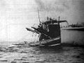 Stern of Imperial Japanese Army's landing craft carrier "Shinshū Maru". The crew is preparing to launch some landing crafts.