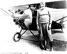 Bert Acosta standing in front of J.T.1 designed by Joseph Terleph