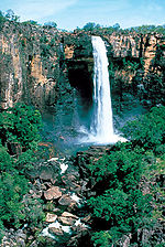 Waterfall falling over rocky escarpment