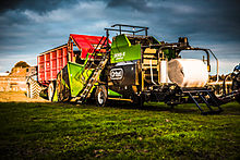 Agricultural baler-wrapper compactor