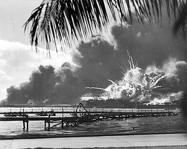 USS Shaw exploding during the attack on Pearl Harbor, by the United States Navy