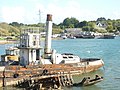 Épaves de bateaux-citerne de la Marine nationale, dans l'anse de Rostellec, aujourd'hui déconstruites.