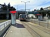 An inbound train arrives at San Jose/Glen Park station, 2018