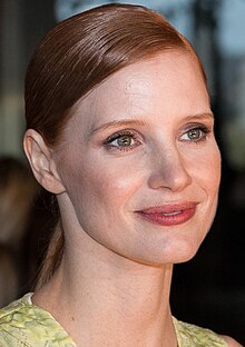 A photograph of Chastain gently smiling