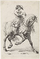 Un Cavalier faisant faire la volte à un cheval.