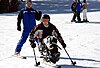 Sgt. Anthony Larson, his adaptive ski instructor close behind, skis down the beginner’s hill on his mono-ski March 9 in Vail, Colo. Larson lost his right leg below the knee while serving in Iraq.