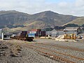 Woolston Railway Station: wagon sidings, foreground; container storage yard, background; loading bank, right.