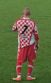 Joueur de l'équipe une (PHR) en août 2013 lors d'un match amical contre Ain Sud Foot (DH).