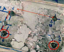 A damaged concrete slab showing incorrect distances in relation to stud placement