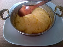 Cheese dish in a copper pan