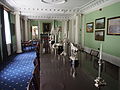 Dining room with silver candelabras and figures