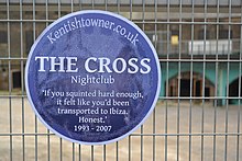 An imitation Blue Plaque commemorating The Cross, as it was being redeveloped.