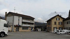 Three-story building with hip roof