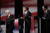 Dodd, Edwards, and Kucinich during the debate