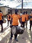 An Agworok drummer by the roadside at Agban, Gworok (Kagoro).