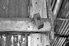 Fig. 10: Steel bolts secure the main structural members. One was too long, and a spacing block has been used as a washer.