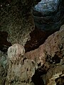 Inghiottitoio, coperto da un lucernario, dal quale il santo si calava per accedere alla grotta.