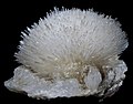 Image 23Natrolite is a mineral series in the zeolite group; this sample has a very prominent acicular crystal habit. (from Mineral)