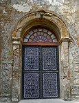 details on the side of a door of the church