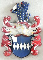 Detail of the heraldic achievement above the effigy