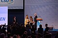 Bundeskanzlerin Angela Merkel erhält auf dem CSU-Parteitag am 12. Dezember 2014 in Nürnberg vom Nürnberger Christkind und Horst Seehofer ein Geschenk.