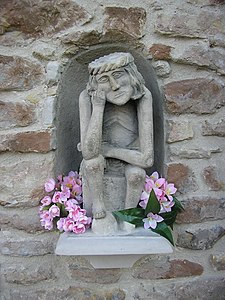 "Pensive Christ" (Chrystus Frasobliwy) at St Sigismund's Church, Szydlowiec, Poland