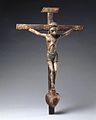 Image 30José Rafael Aragón, Crucifix, ca. 1795–1862, Brooklyn Museum, From about 1750, Catholic churches in Spanish New Mexico were increasingly decorated with the work of native craftspeople rather than with paintings, sculpture, and furniture imported from Europe. This small santo (religious image) is typical of the locally produced objects. It is made of indigenous pine and painted with water-based pigments used by native artisans. (from History of New Mexico)