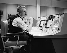 Eugene F. Kranz at his console at the NASA Mission Control Center