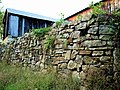 A fieldstone wall enclosing a Pennsylvania barnyard