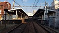 The platforms viewed from the level crossing on the west side in January 2017