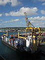 Image 25A container ship docked in the deep water harbour of Bridgetown, Barbados, which opened in 1961. (from History of the Caribbean)