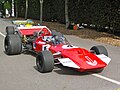 Initially Surtees raced with a red car with white accents