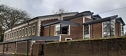 New Hall 1961 (left) with music rooms extension, 2014