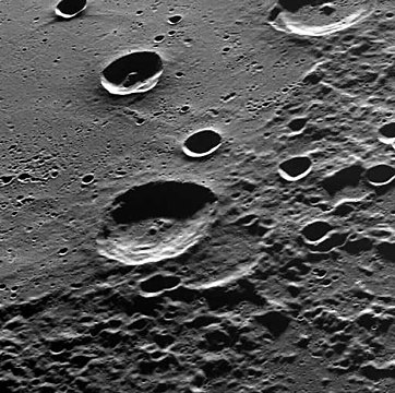 Anguissola is shown on the rim of the large crater Henri